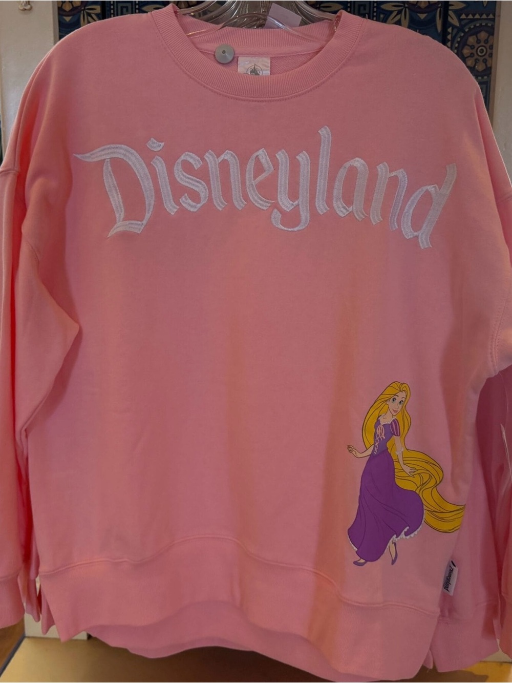 2026 NWT Disney Disneyland Rapunzel Tangled Pink Sweatshirt Pullover Adult